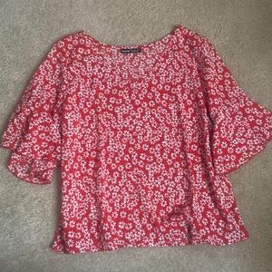 Red 3/4 sleeve shirt with white flowers
